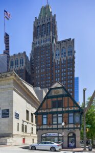 10 Light Street's art deco western facade towers over the Tudoresque FedEx office at 11 South Charles Street.