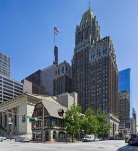 10 Light Street's art deco western facade towers over the Tudoresque FedEx office at 11 South Charles Street.