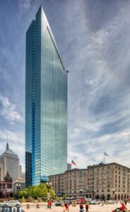 200 Clarendon Street, aka John Hancock Tower, reflects the sky and everything around it in the famous blue glass panels.