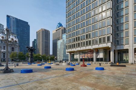 Municipal Services Building is set in a broad plaza across John F Kennedy Boulevard from Philadelphia City Hall.
