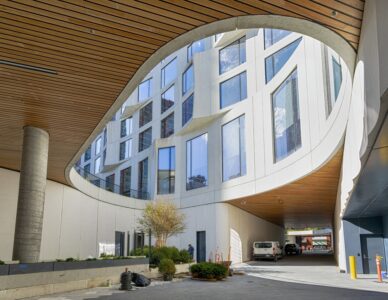 11 Hoyt Street in Downtown Brooklyn is a residential condo skyscraper with a unique wavy white facade of precast concrete panels and drive-through motor court. Designed by Studio Gang architects.