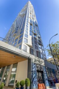 11 Hoyt Street in Downtown Brooklyn is a residential condo skyscraper with a unique wavy white facade of precast concrete panels and drive-through motor court. Designed by Studio Gang architects.