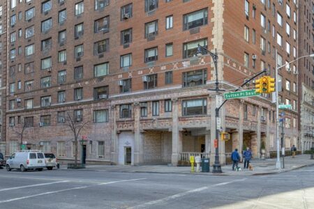 2 Sutton Place South is an Emery Roth-designed cooperative apartment building with unique corner porte cochere.