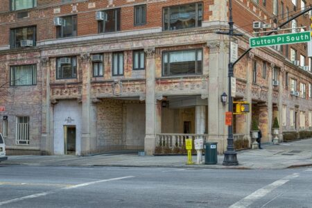 2 Sutton Place South is an Emery Roth-designed cooperative apartment building with unique corner porte cochere.