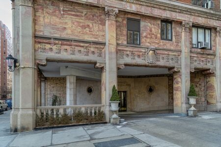 2 Sutton Place South is an Emery Roth-designed cooperative apartment building with unique corner porte cochere.