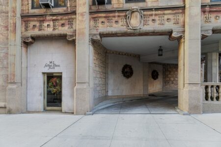 2 Sutton Place South is an Emery Roth-designed cooperative apartment building with unique corner porte cochere.