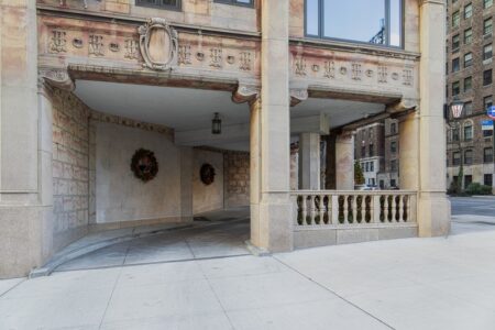 2 Sutton Place South is an Emery Roth-designed cooperative apartment building with unique corner porte cochere.