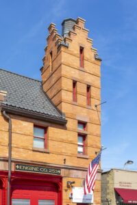The City of Brooklyn built this fire station in Bensonhurst just two years before the borough merged with New York City. The station, at 2425 86th Street, originally housed Engine Company 53; later 153, before becoming 253. The Dutch Renaissance style reflects Bensonhurst’s Dutch origins.