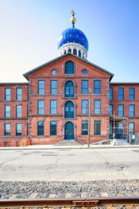 Colt Firearms Factory, on Van Dyke Avenue, with its distinctive gold star-spangled blue onion dome.