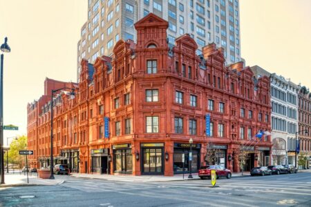 Goodwin Hotel, originally Goodwin Apartments, was built at the corner of Asylum and Haynes Streets in 1881. It was expanded in 1891 and again in 1900; the Goodwin Square Tower was added in 1989, as the apartments were converted to a hotel.