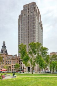 Connecticut Financial Center, towering over City Hall on the east side of New Haven Green, was built in 1990, designed by Crang and Boake.