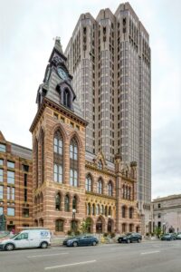 New Haven’s City Hall was built in 1861, designed by Henry Austin; the County Courthouse annex was completed in 1873, designed by David R. Brown.