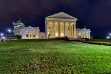 The Virginia State Capitol core – the building minus the wings that were added in 1906 – was designed by Thomas Jefferson and Charles-Louis Clerisseau in the image of a Roman Temple, Maison Caree. The neo-Classical temple form is said to have set a design precedent for public buildings in the United States. In keeping with the “temple” form, the building is one of a dozen U.S. state capitols without an exterior dome. Inside, however, the central rotunda is domed.
