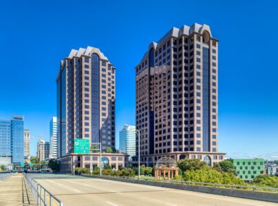 Riverfront Plaza is a pair of red granite-faced office towers overlooking Kanawha Canal and James River, just east of the Federal Reserve Bank of Richmond.